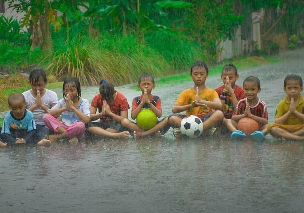 Playing with friends in the rain